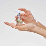 milk-shake-energizing-blend-scalp-treatment-in-hand